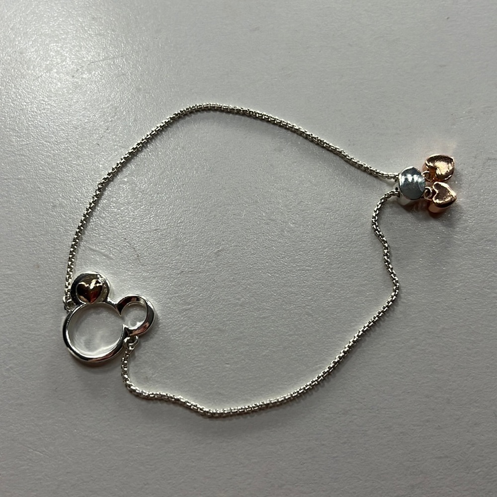 silver and rose gold Mickey bracelet